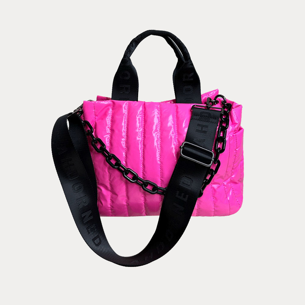 Rosie Quilted Nylon Tote in Pink, shown with resin chain and black adjustable strap