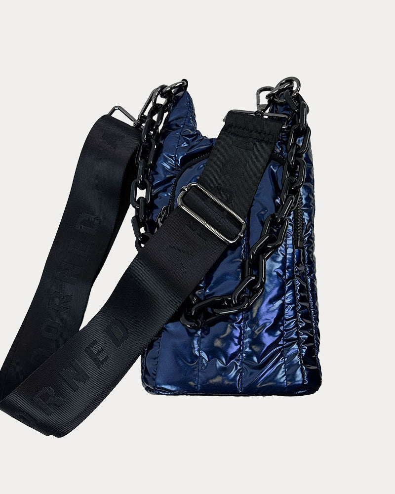 Roxy Quilted Nylon Water Bottle bag in Navy, shown with resin chain and black adjustable strap