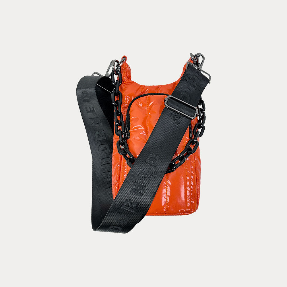 Roxy Quilted Nylon Water Bottle bag in Orange, shown with resin chain and black adjustable strap