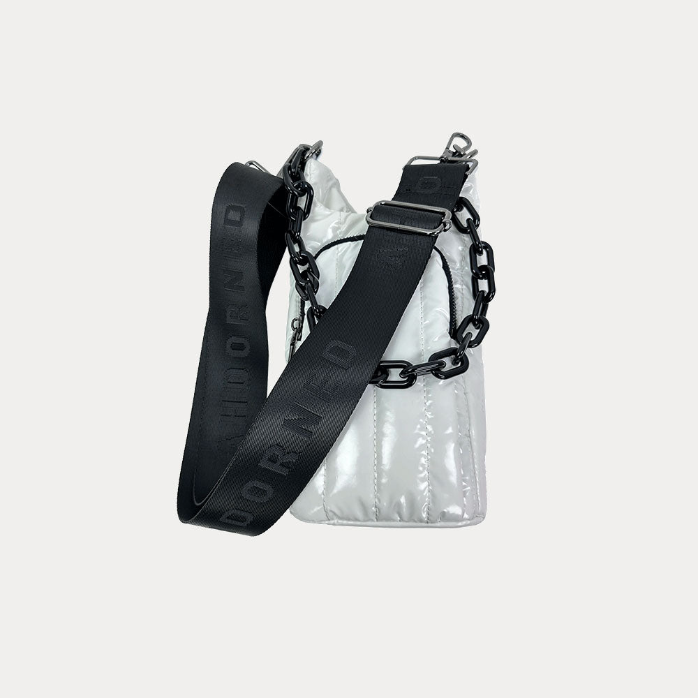 Roxy Quilted Nylon Water Bottle bag in White, shown with resin chain and black adjustable strap