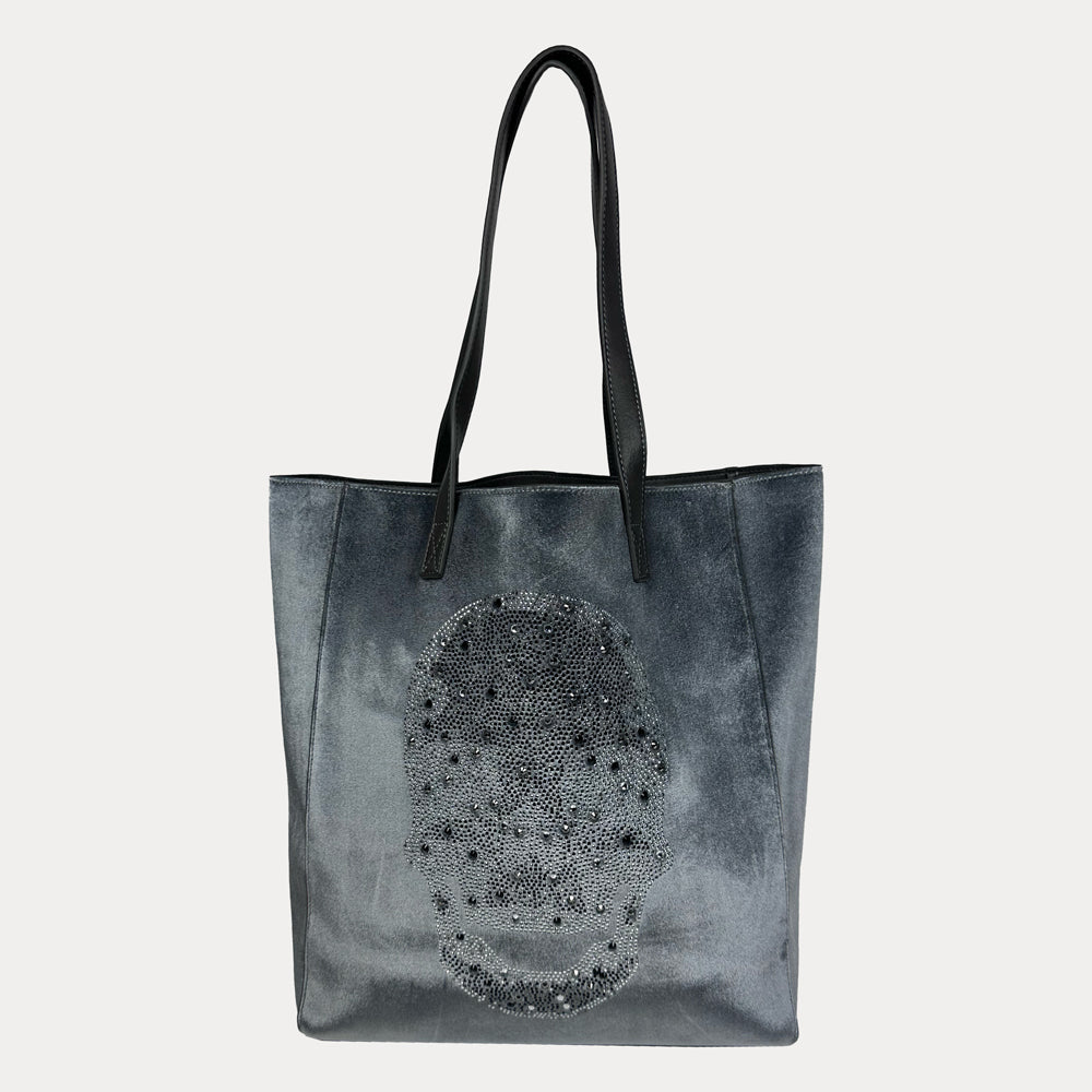 Gray tote bag with skull rhinestone embelishment on a light gray background