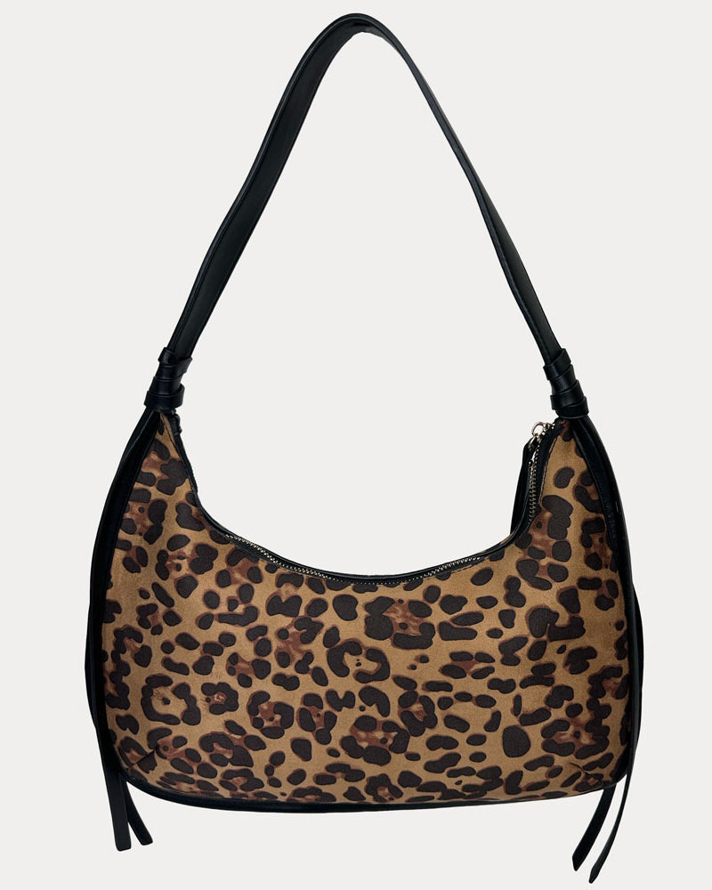 A shoulder bag with a brown and black leopard print pattern and black trim, shown against a light gray background.