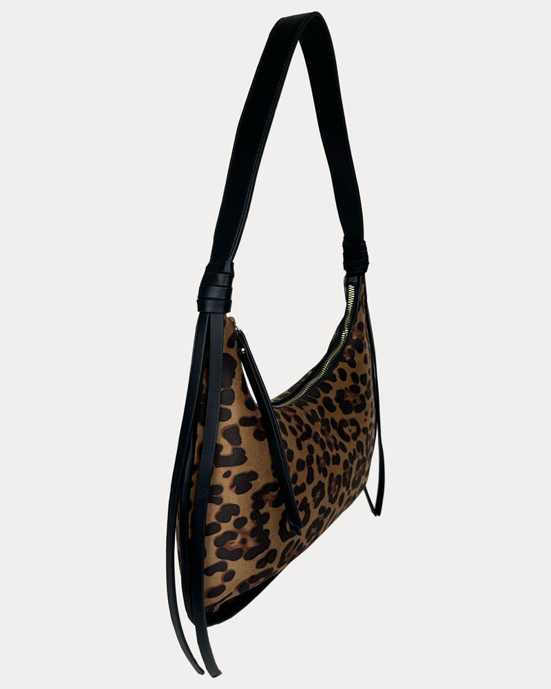 A shoulder bag with a brown and black leopard print body and solid black strap, shown against a light gray background.