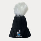 Black ski bunny hat with white pom pom and blue moon ski bunny patch