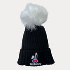 Black ski bunny hat with white pom pom and pink ski bunny patch