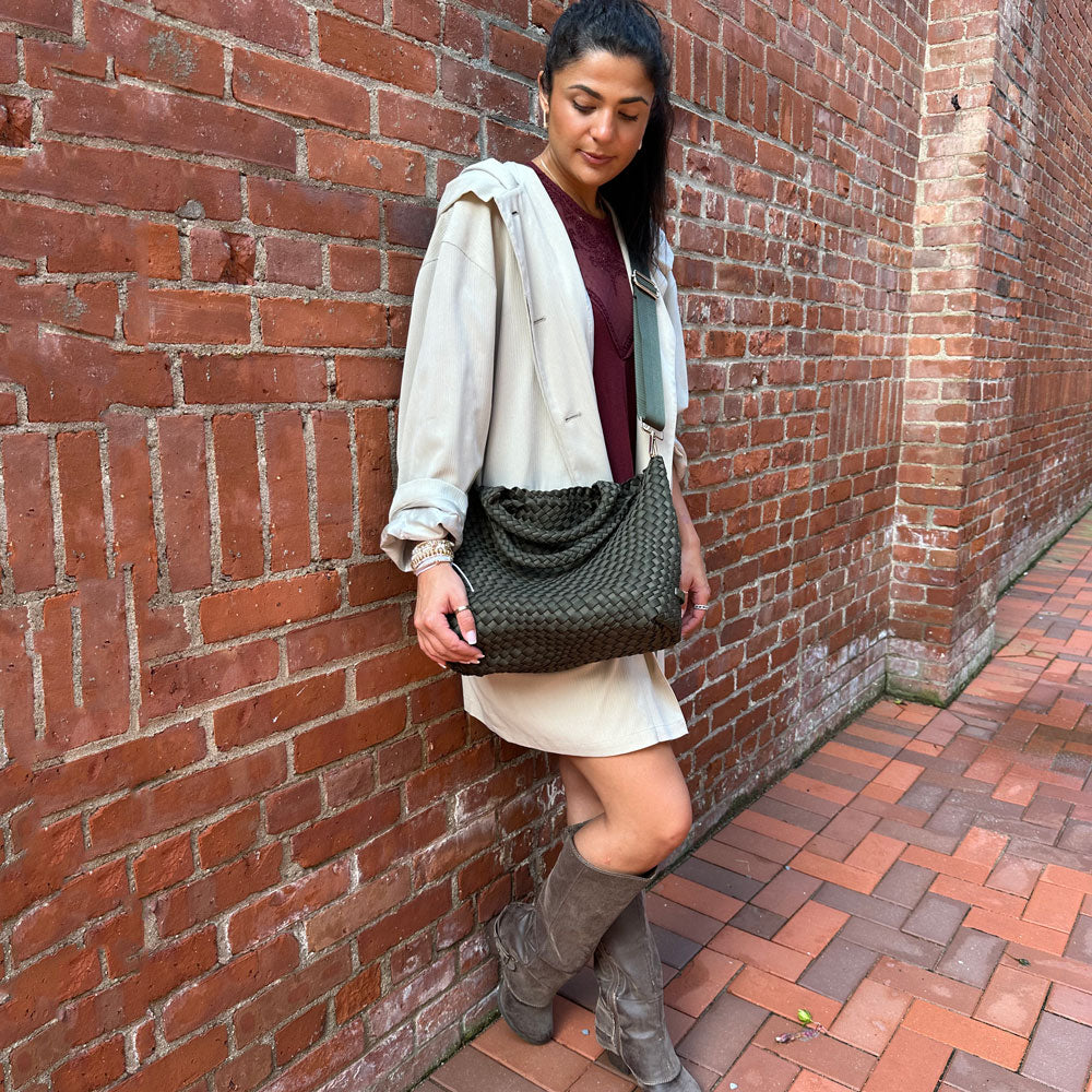 woman wearing lily army woven neoprene tote as a crossbody