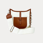Amelia Canvas Messenger with Camel Vegan Leather details.  A chain strap and a  2" adjustable bag strap.