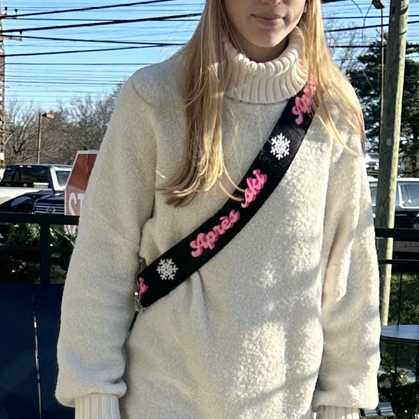 woman wearing apres ski printed ski bunny strap in pink