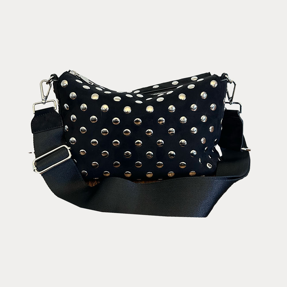 Black bag with silver studs on a light gray background