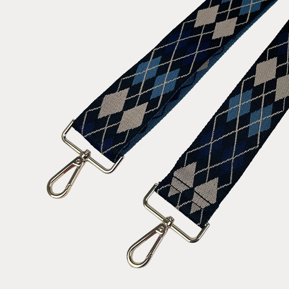 Navy, Blue, Cream Argyle Pattern Bag Strap with gold metal clasps on a white background