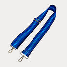 Royal Blue and Bright Blue patterned bag strap on a light gray background