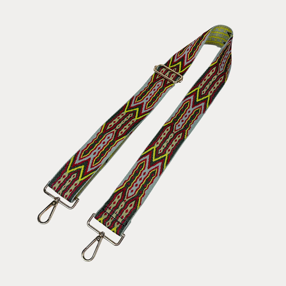 Grey, Army, Red patterned strap with gold hardware on a light grey background