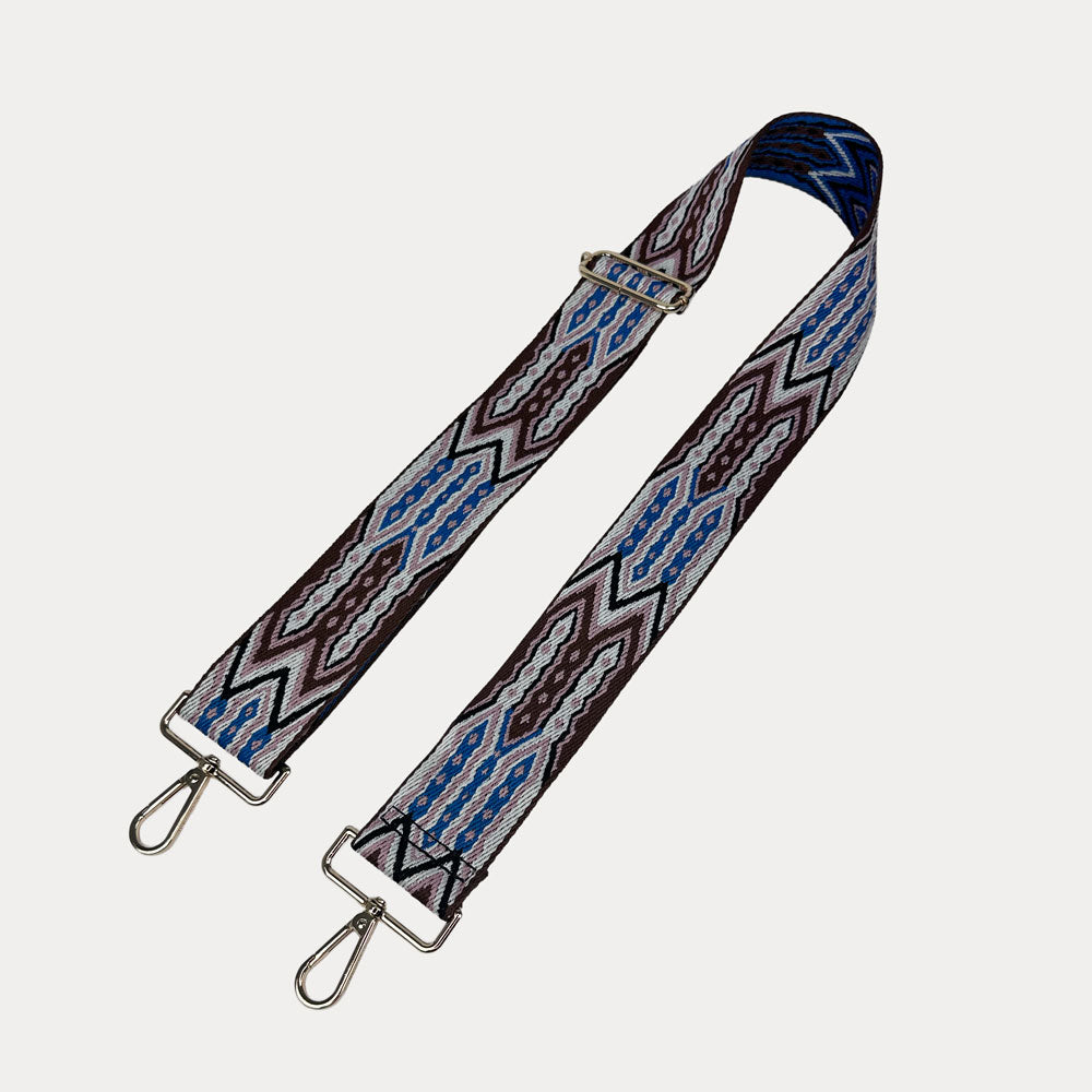 Light Pink, Brown, White patterned strap with gold hardware on a light grey background