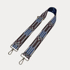 Light Pink, Brown, White patterned strap with gold hardware on a light grey background