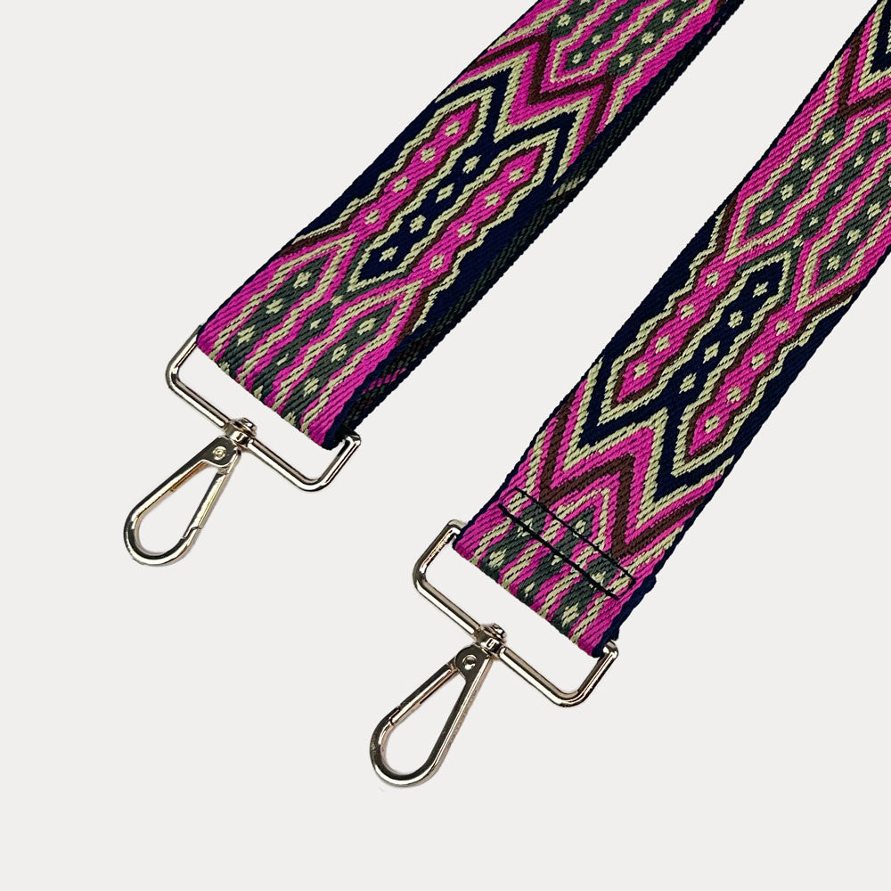 Pink, Black, Tan patterned strap with gold hardware on a light grey background