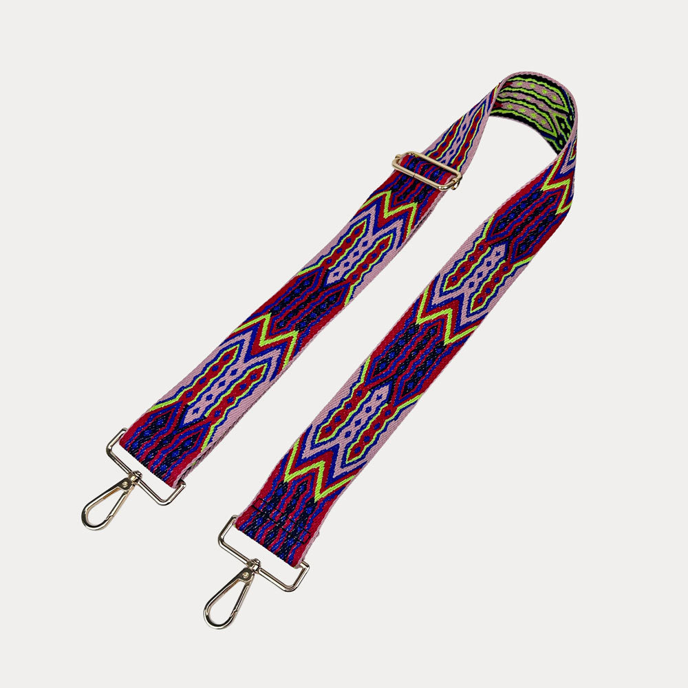 Purple, Red, and Pink patterned strap with gold hardware on a light grey background