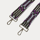 White, Brown, Pink patterned strap with gold hardware on a light grey background