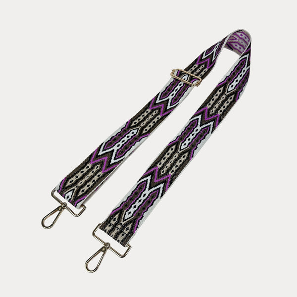 White, Brown, Pink patterned strap with gold hardware on a light grey background
