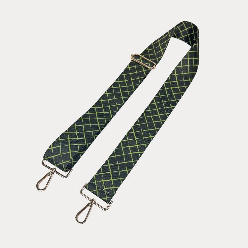 Army green and lime patterned strap with gold hardware on a white background