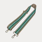 Gold, Green, White, Kelly, Pink metallic striped bag strap with gold hardware on a light grey background