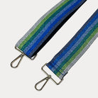 White, Lime, Green, Light Blue, Gold, Black metallic striped bag strap with gold hardware on a light grey background
