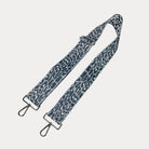 Silver Glitter Cheetah print bag strap on a light gray background