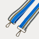 Aqua, Grey, and White striped bag strap with gold hardware light gray background