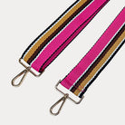 Pink, Brown, and Tan striped bag strap with gold hardware light gray background