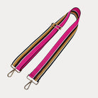 Pink, Brown, and Tan striped bag strap with gold hardware light gray background