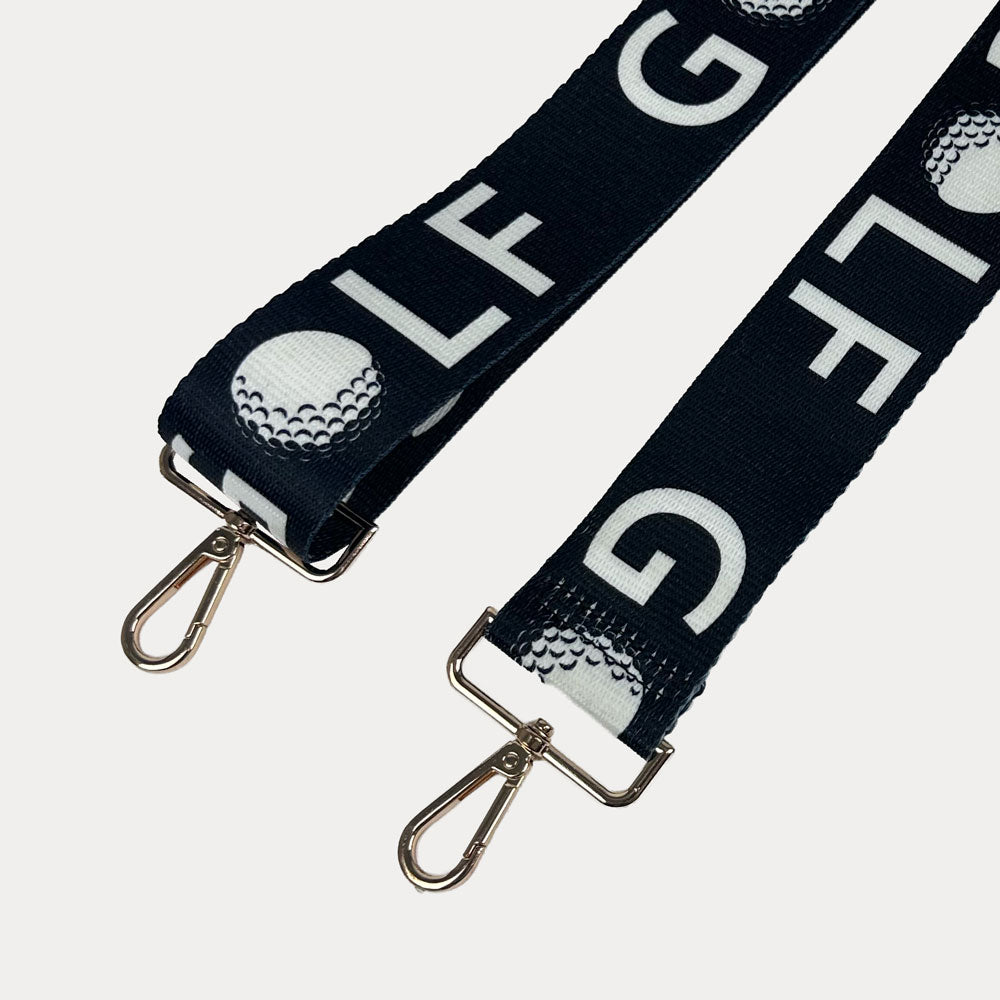 Black ground with text Golf graphics  with gold hardware bag strap