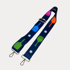 Navy ground with colorful pickleball paddles and white pickleball graphics with gold hardware bag strap