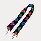 Black ground with colorful pickleball paddle graphics with gold hardware bag strap