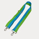 Lime and Aqua striped bag strap with gold hardware on a light gray background
