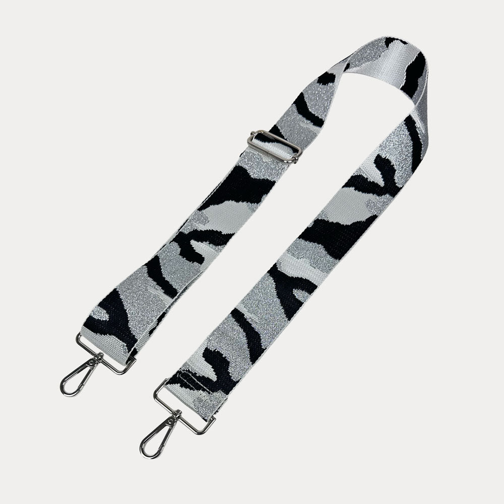 White, grey, and black camouflage patterned strap on a white background