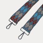 Grey, Light Blue, Tan, Burgundy Argyle Pattern Bag Strap with silver metal clasps on a white background