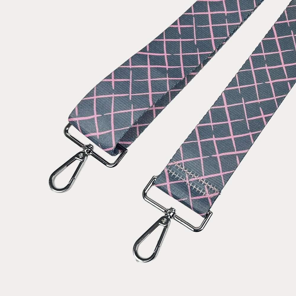 Grey and pink patterned strap with silver hardware on a white background