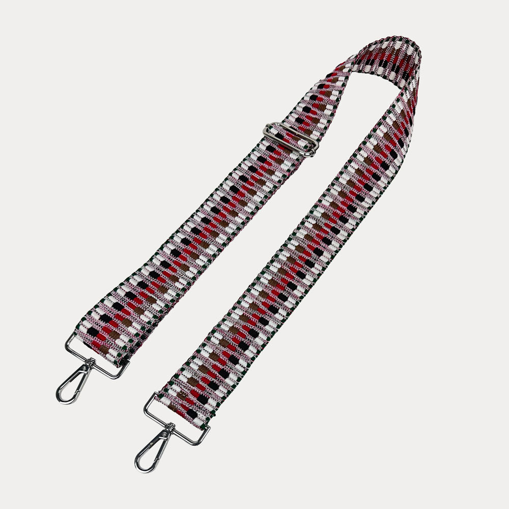 White, Black, Cranberry Multi Embroidered Patterned bag strap with silver hardware on a light gray background