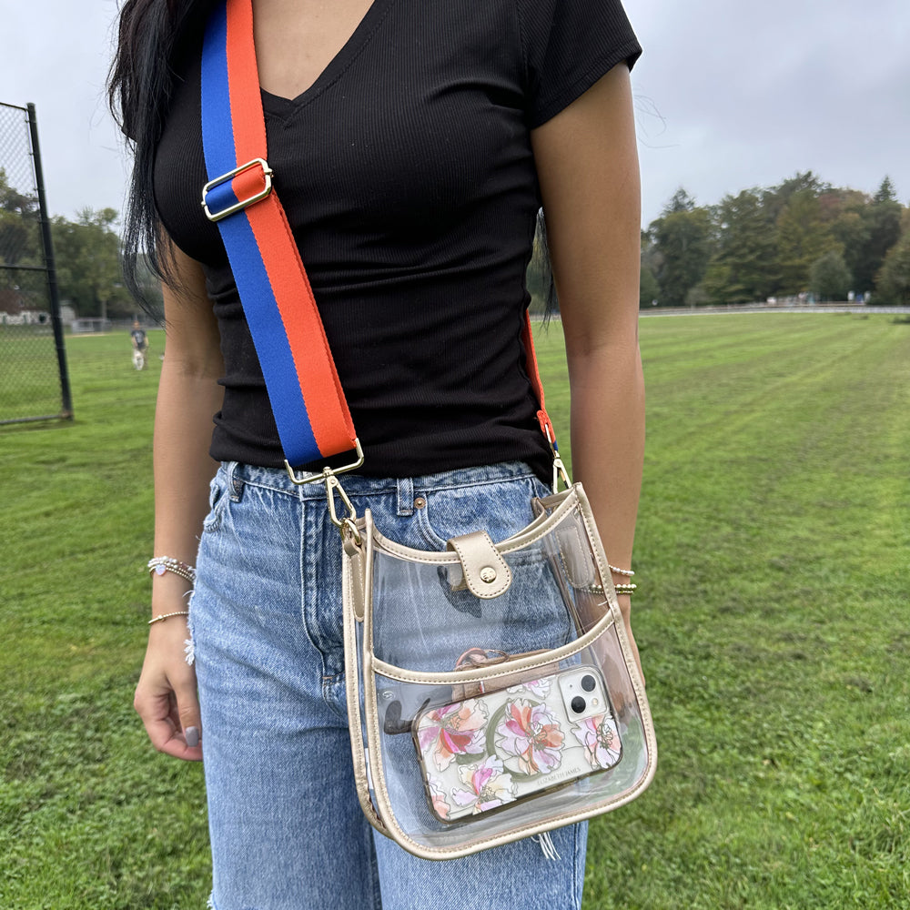 Woman wearing the Bailey Clear Messenger with Vegan Metallic Gold Leather