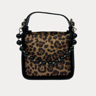 Handbag with Leopard Print and  Black Vegan Leather Details with Black Bead Trim. Front View