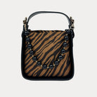 Handbag with Zebra Print and  Black Vegan Leather Details with Black Bead Trim. Front View