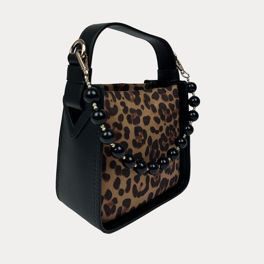 Handbag with Leopard Print and  Black Vegan Leather Details with Black Bead Trim. Side View