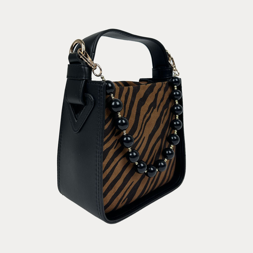Handbag with Zebra Print and  Black Vegan Leather Details with Black Bead Trim. Side View