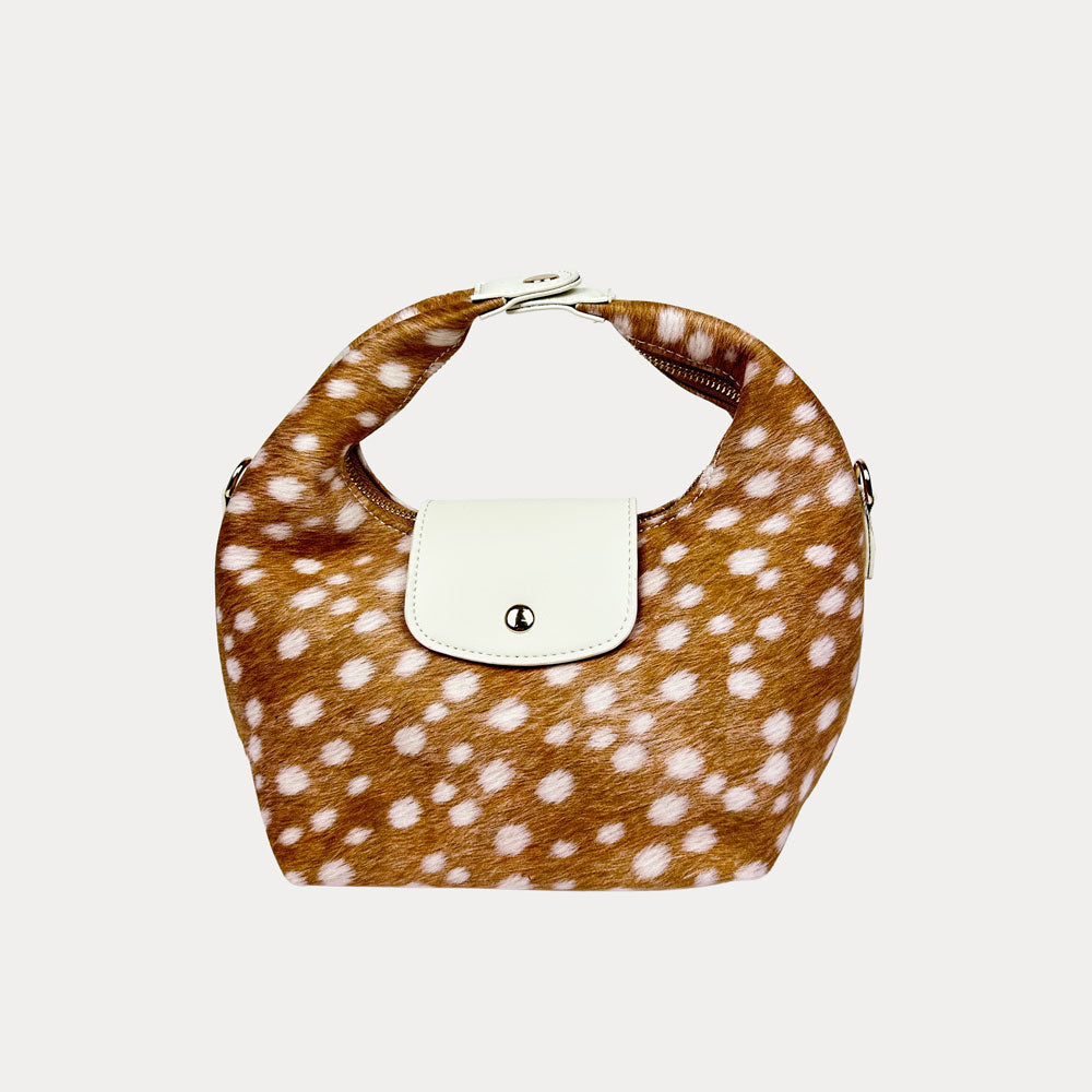 Handbag with deer print and cream leather accents on a light gray background- Front View