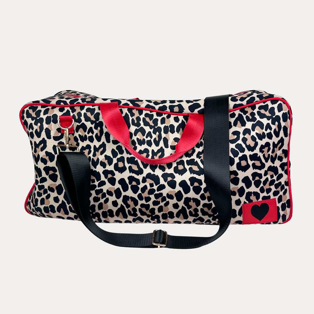 Leoaprd Printed Mahjong Bag with red handles and a black adjustable crossbody bag strap.