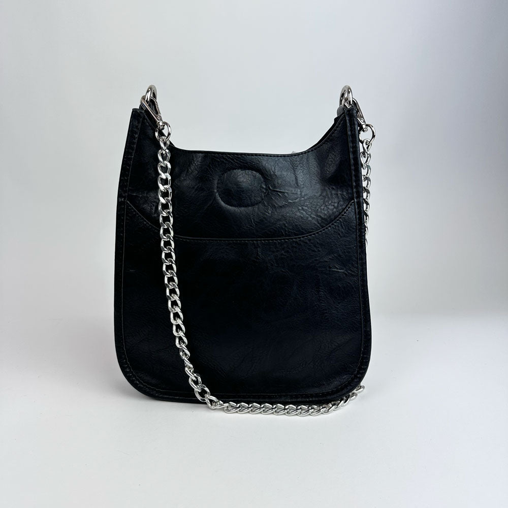 Black Handbag with silver metal chain bag strap on a light grey background