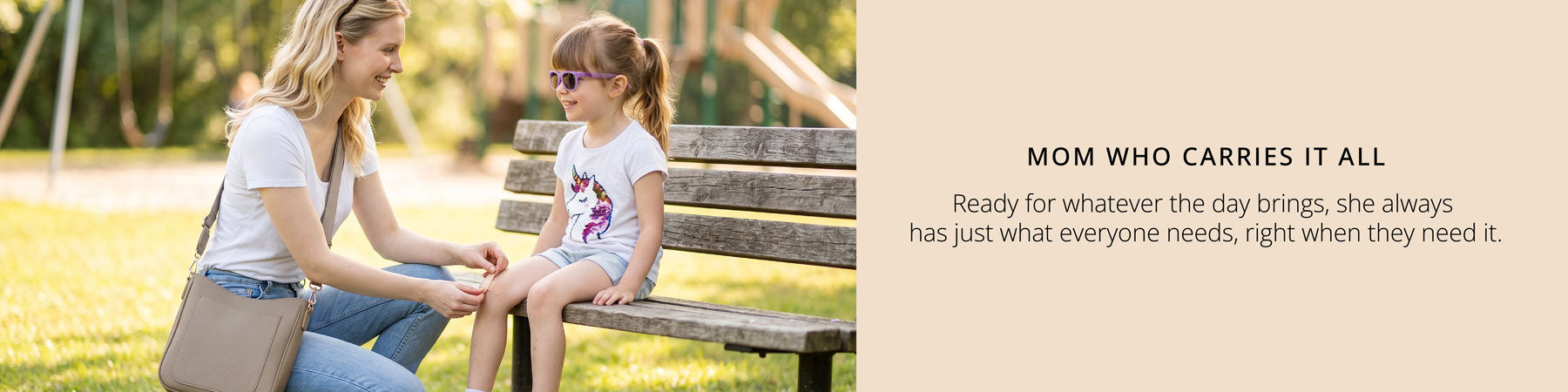 Woman putting a bandaid on her child sitting on a bench with text about a 'Mom Who Carries It All'.