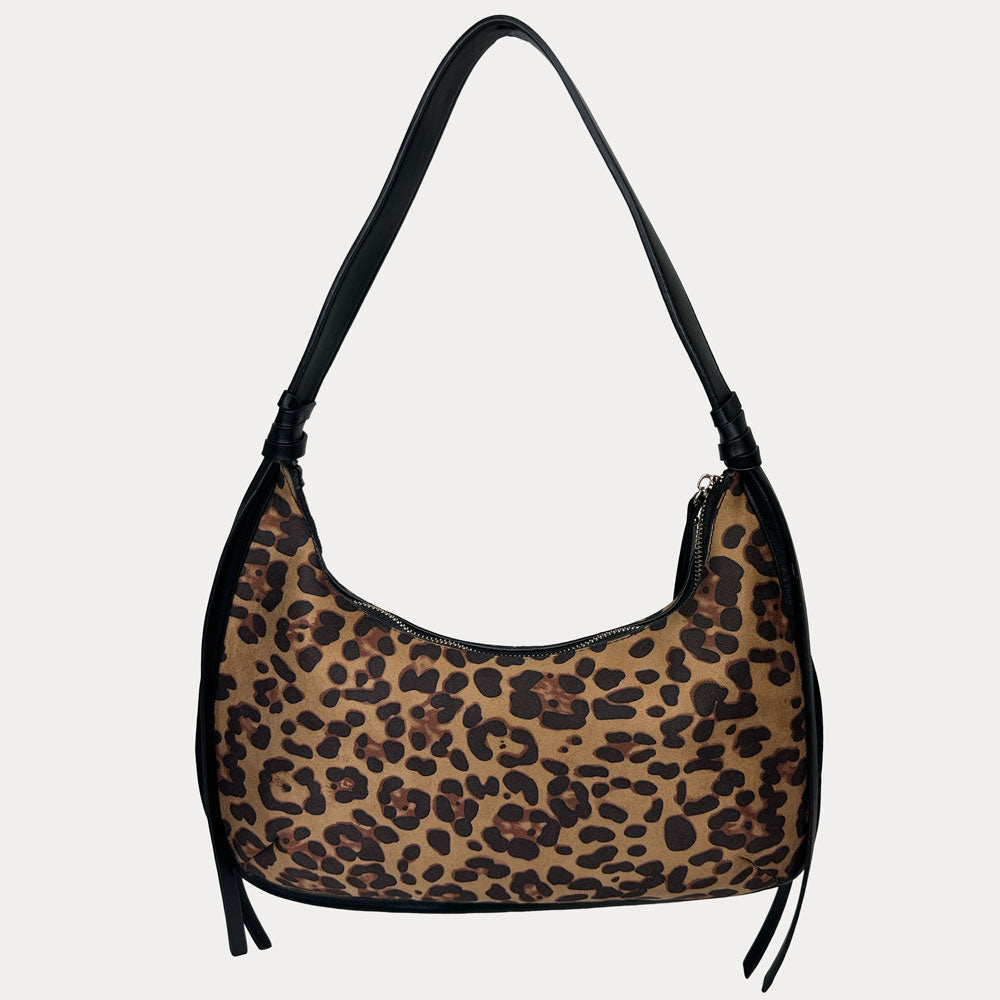 A shoulder bag with a brown and black leopard print pattern and black trim, shown against a light gray background.