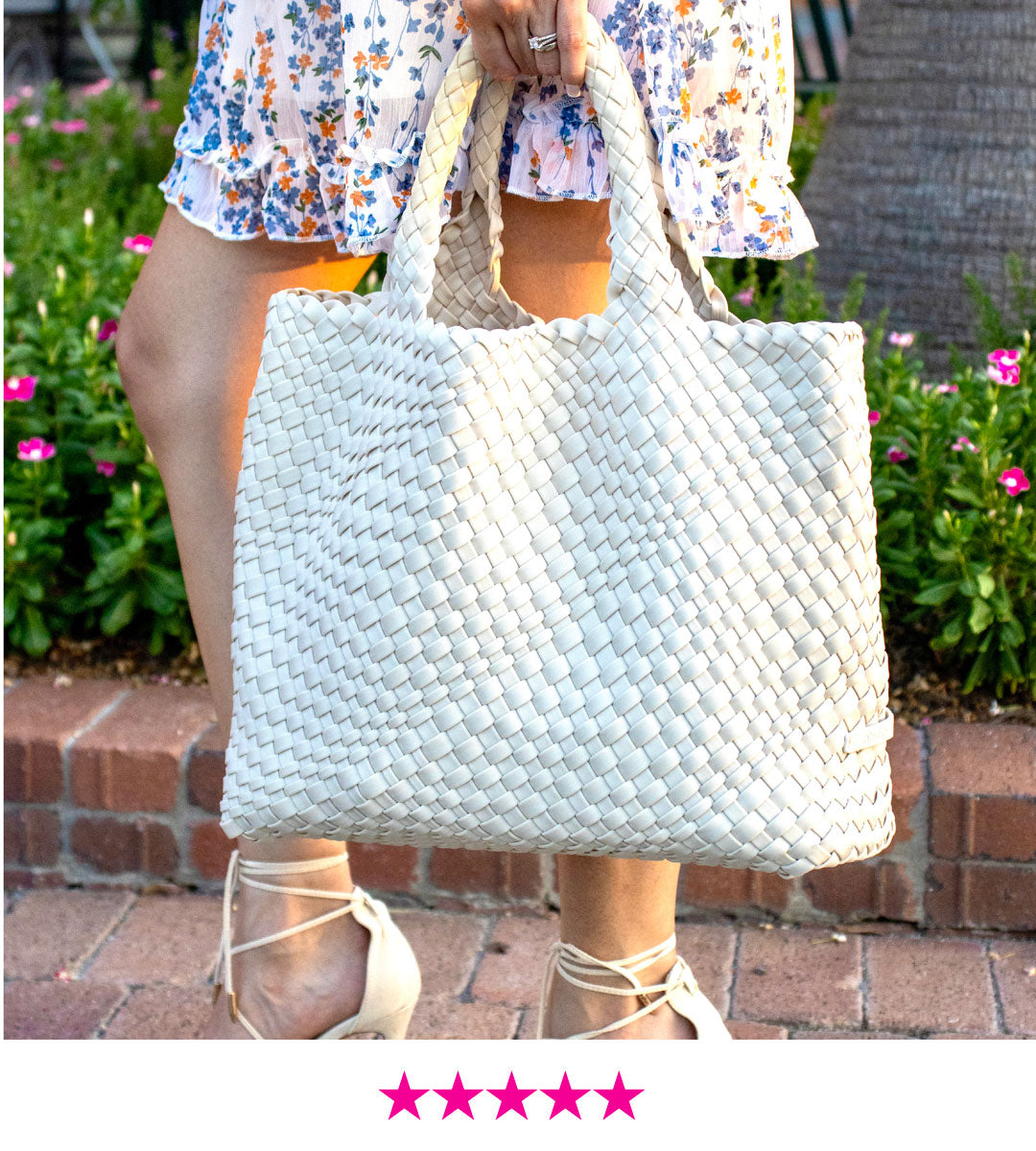 Image of a Woman holding the Lily Woven Neoprene Tote in Ecru