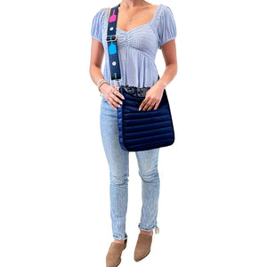 Woman Modeling Navy Everly Quilted Puffy Messenger Bag